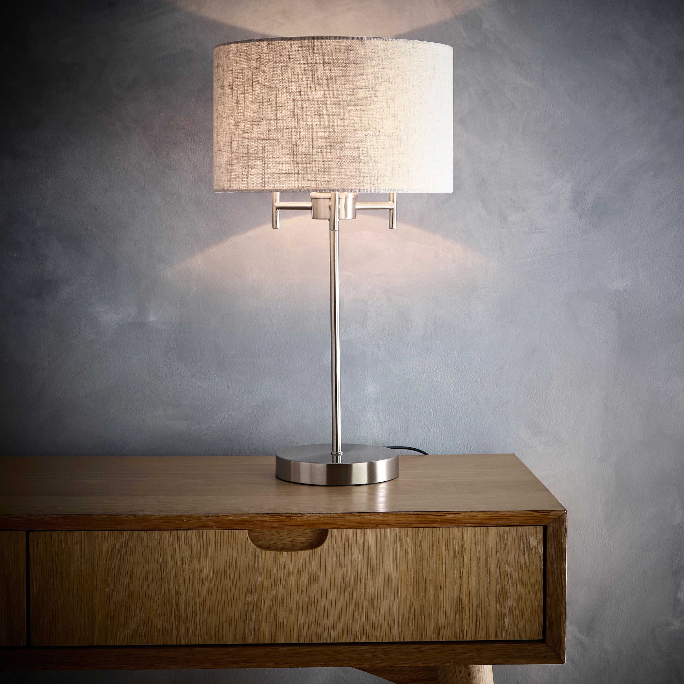 Tall Table Lamp in a Satin Nickel Finish with a Linen Lampshade to compliment the full design
