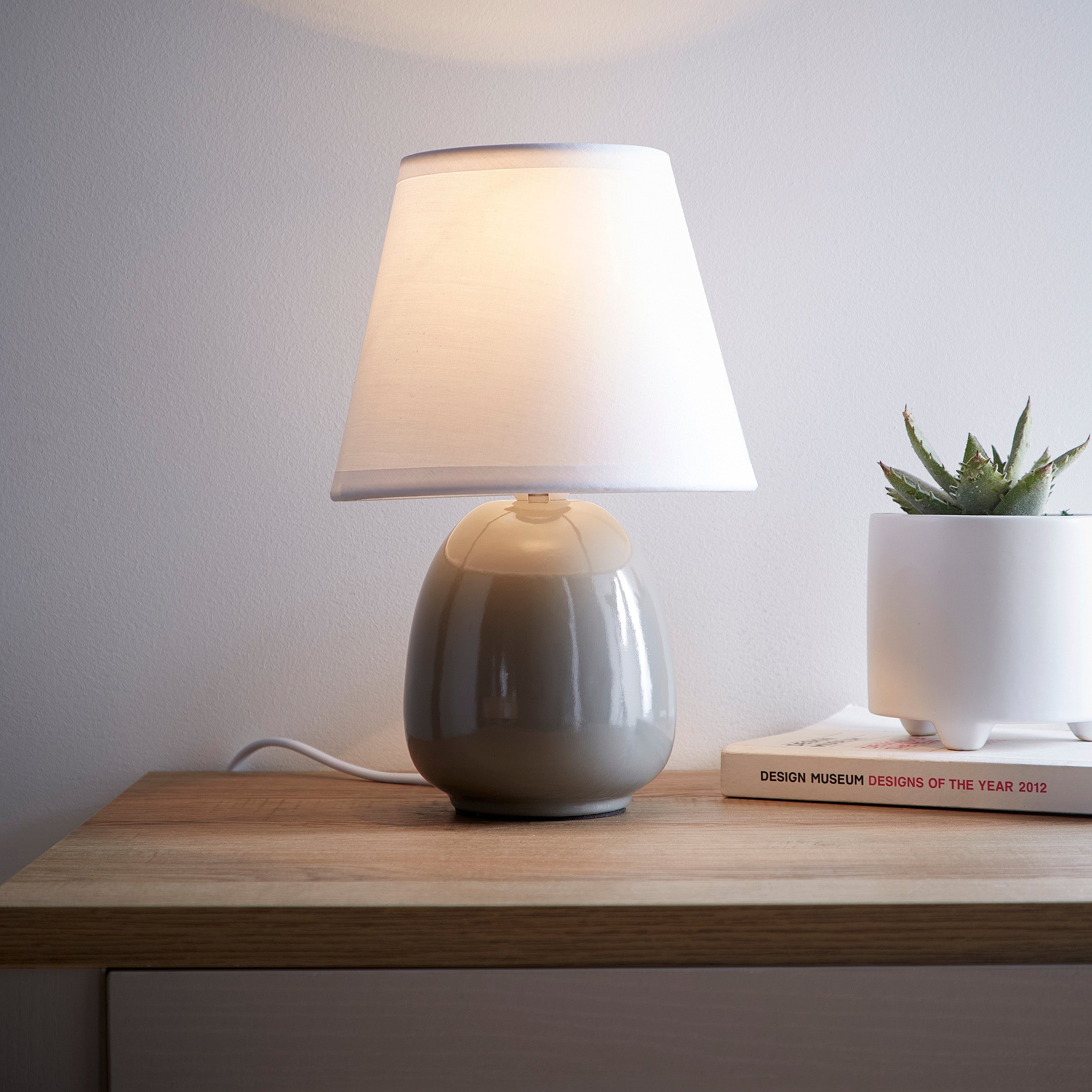 Small Ceramic Bedside or Table lamp with White Lampshade available in 3 Colours