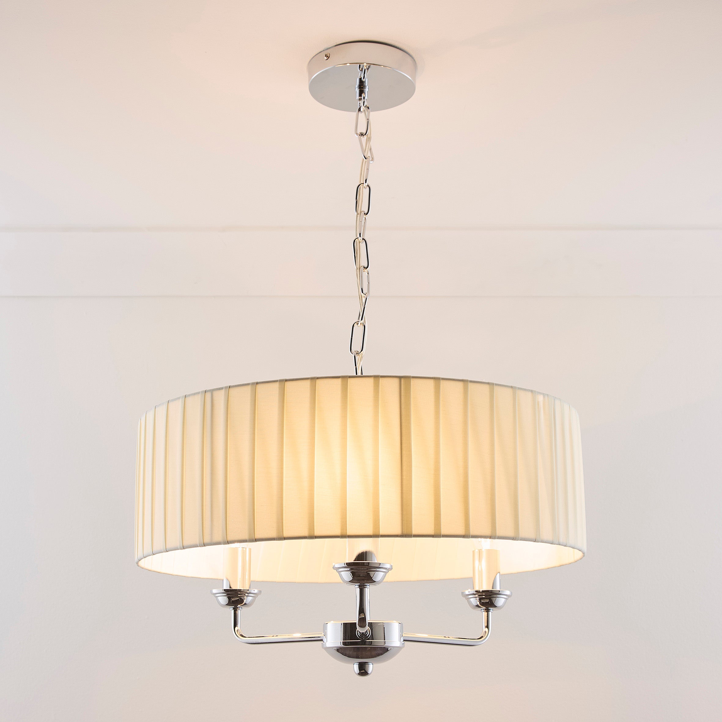 3 Light Pleated shade Chandelier with a 3 arm Polished Chrome Frame available in Cream, Grey and Navy